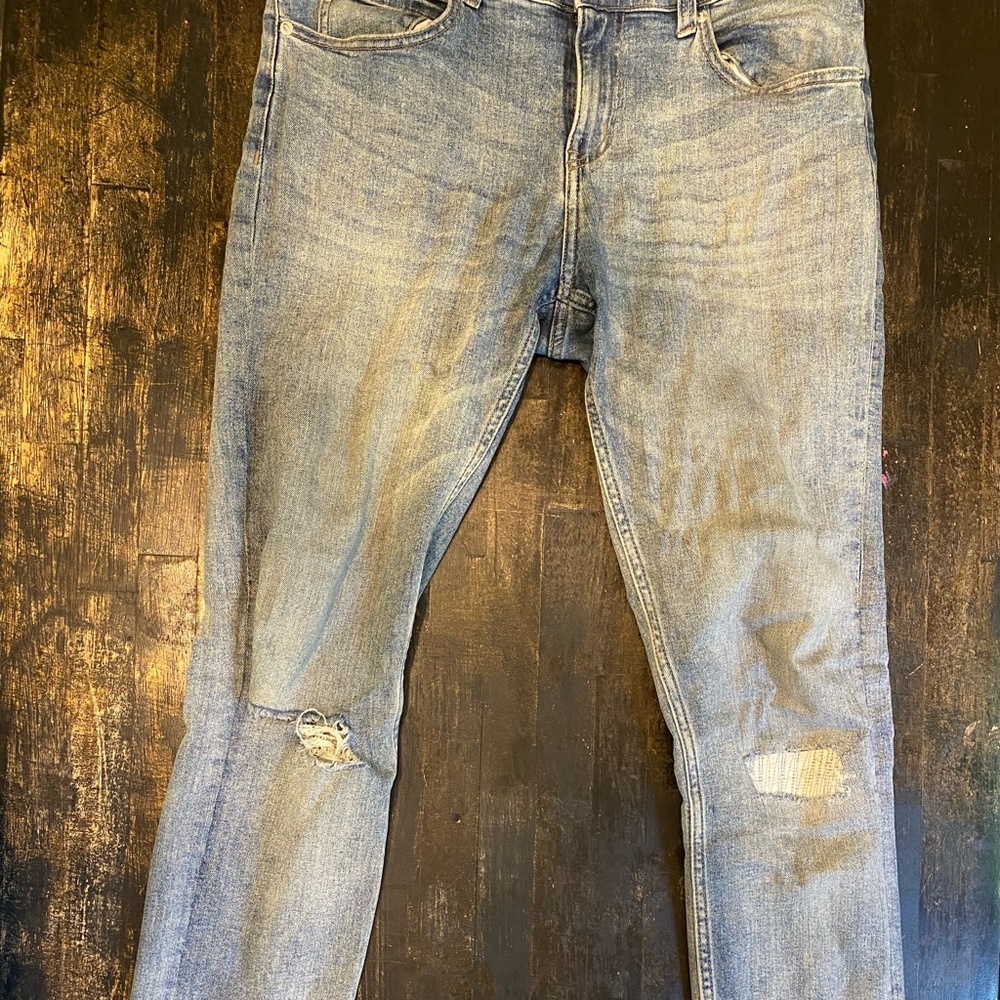 Cheap Monday skinny jeans in light blue with rips